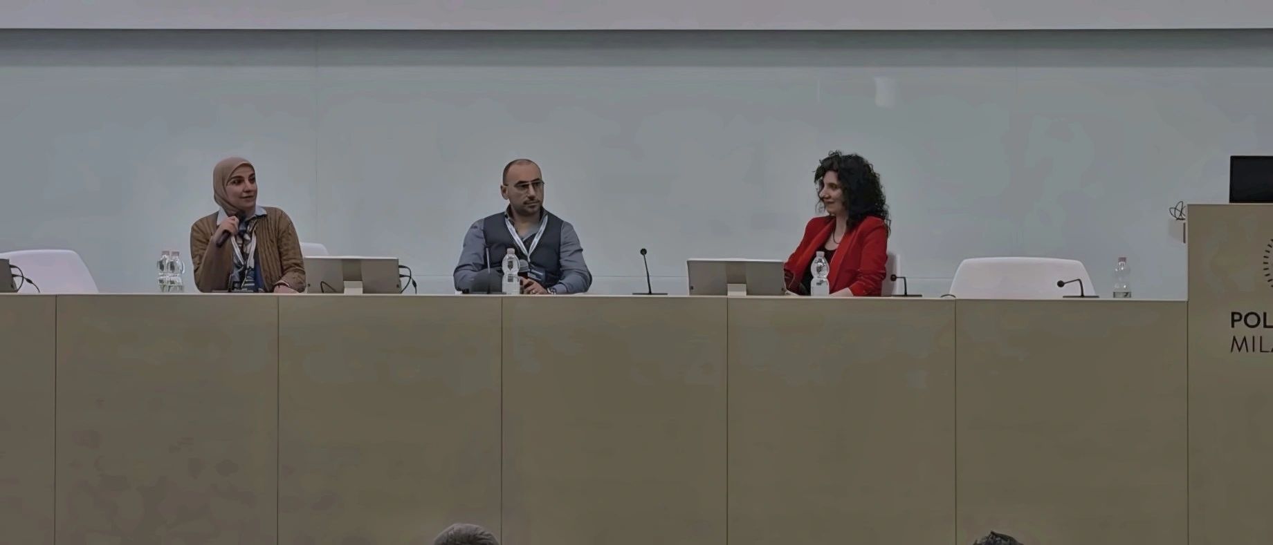 Asmaa Ibrahim speaking at Politecnico di Milano panel